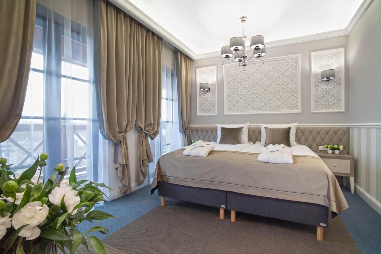 Boutique Odyseja & Spa 시에초시네크 외부 사진 A bedroom in the hotel
