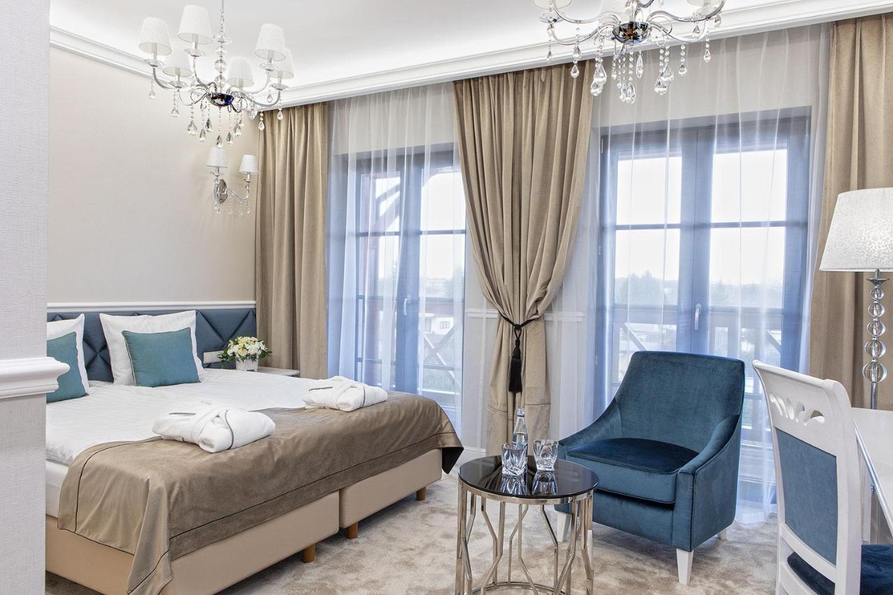 Boutique Odyseja & Spa 시에초시네크 외부 사진 A bedroom in the hotel